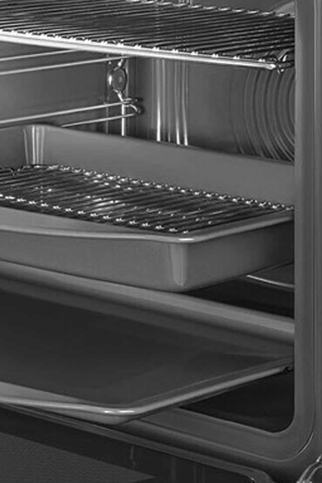 Oven interior with racks and trays